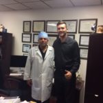 Dr. Goswami and Evan, Pro MMA Fighter at the Newport Beach clinic.